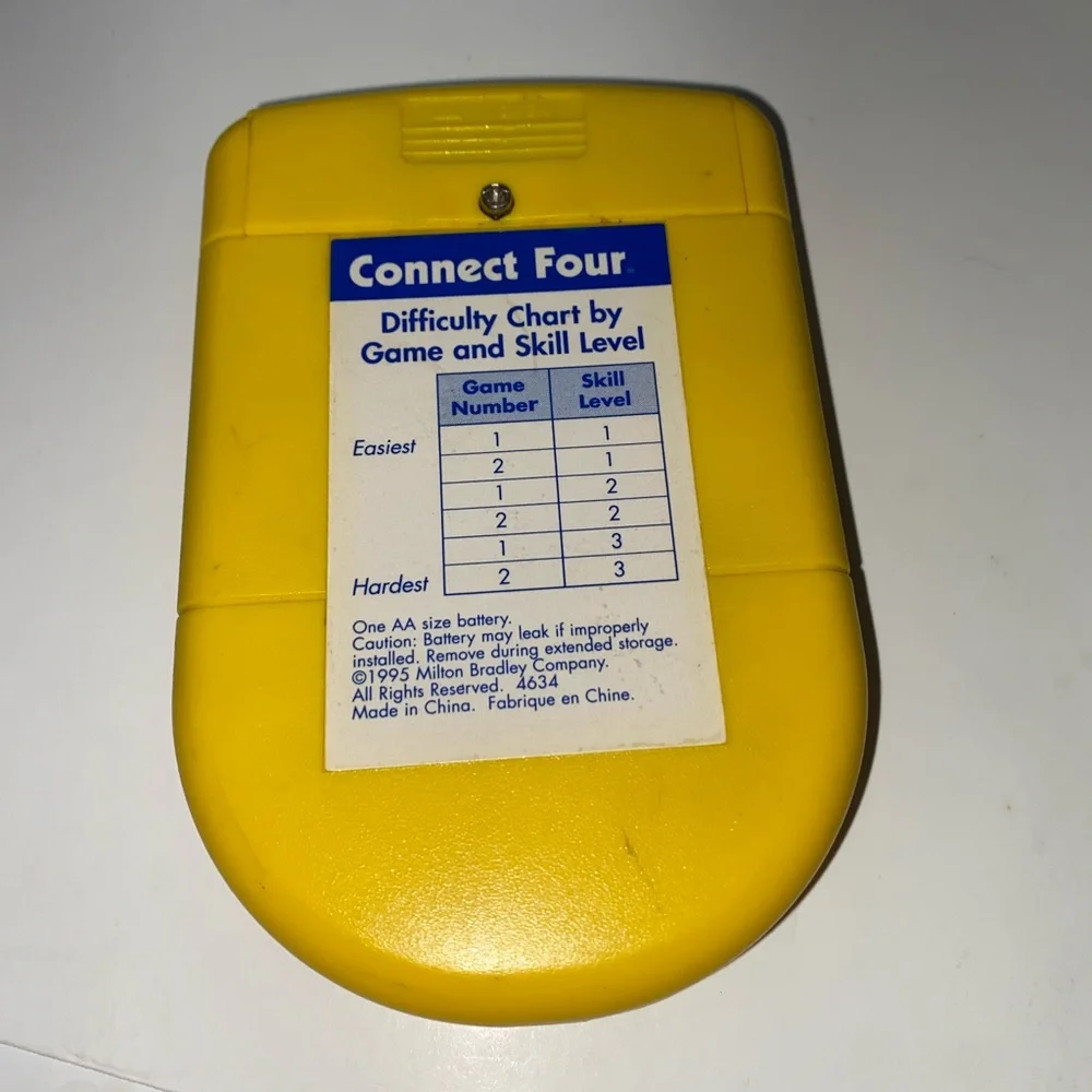 * Connect Four Electronic Handheld Game by Milton Bradley 1995